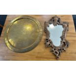 Vintage gilt framed mirror and a brass charger- largest measures 23 inches diameter