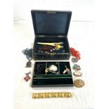 Antique leather jewellery box containing assorted costume jewellery