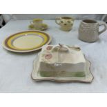 Selection of Clarice Cliff items to include a matching cup and saucer, milk jug, plate etc and a