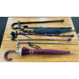 Selection of ladies walking sticks and umbrellas with stand
