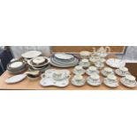 Large selection of part tea and dinner services one hand painted to include meat trays, cups,