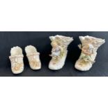 Meissen pottery boots + 2 others, has sustained damage
