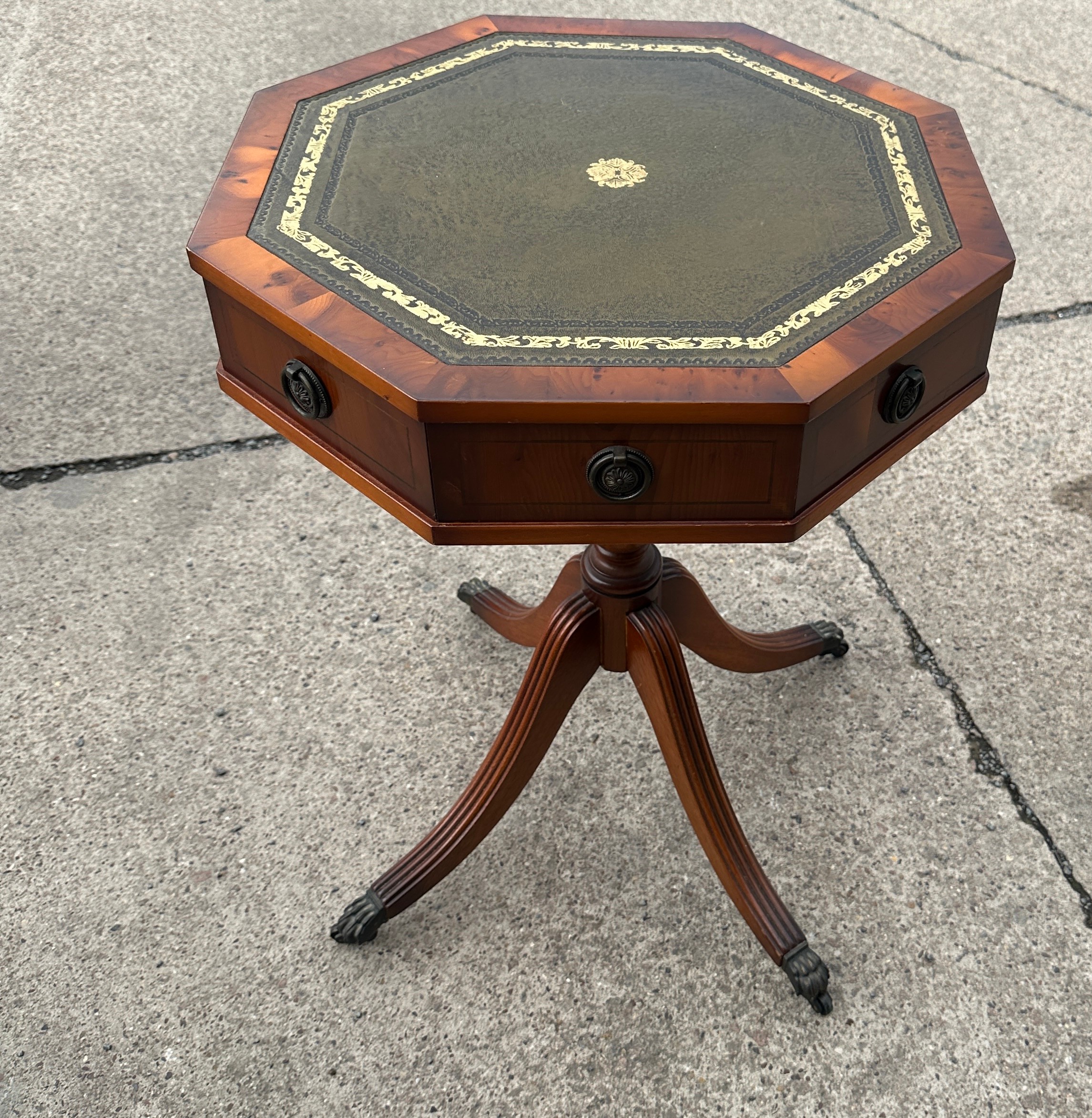 Reproduction leather topped drum table measures approx 26 inches tall