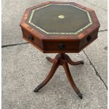 Reproduction leather topped drum table measures approx 26 inches tall