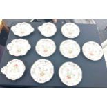 Six hand painted oriental plates and three hand painted oriental serving dishes no marks to base