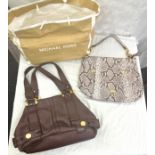 Two authentic Micheal Kors Brown ladies hand bags