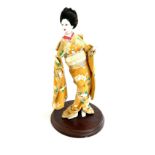 Vintage hand painted geisha girl on stand measures approx 15 inches tall