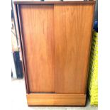 Teak 2 sliding door 1 draw wardrobe measures approximately 6inches tall 40 inches wide 23 inches