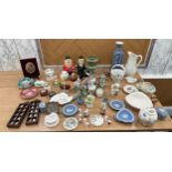 Large selection of assorted pottery items to include figures, vases, trinkets etc