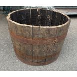 Vintage oak barrel measures approximately 26 inches diameter 18 inches tall