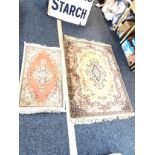 2 Lounge rugs largest measures 64 inches long 47 inches wide