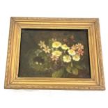 Signed framed oil on canvas painting depicting flowers frame measures approximately 12 inches wide