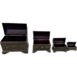 Four Oriental inlaid graduating chests largest measures 19 inches tall by 24 inches wide