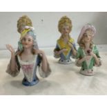 Four vintage porcelain lady pin cushion tops all signed