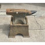 Vintage anvil with original stand measures approx 21 inches tall by 21 inches wide