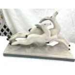 Pottery gazelle figure 13 inches tall 20 inches wide 5.5 inches depth