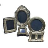 5 small silver picture frames largest measures approx 13cm by 10cm