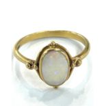 Ladies 18ct gold opal set dress ring, ring size approximately R, weight 3 grams