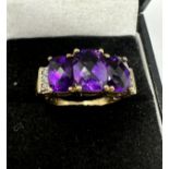 9ct gold diamond & amethyst ring 4.1g