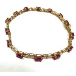 9ct gold ruby & diamond tennis bracelet (8.4g)