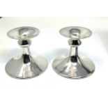 pair of silver candlesticks james dixon & sons measure approx 11cm dia height 9cm