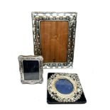 3 silver picture frames largest measures approx 19cm by 14cm