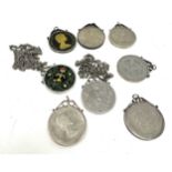 Collection of silver pendant mounted coins