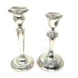 2 silver hallmarked candle sticks largest measures approx height 20cm