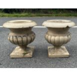 Pair of two small concrete gardens urns measures approx 11 inches tall