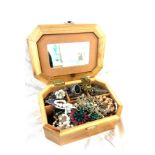 Selection of costume jewellery to include necklaces, rings etc in a wooden embroidered jewellery box