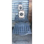 2 metal folding bistro chairs with mosaic back