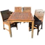 Square teak table and 4 chairs, approximate table measurements: Height 29.5 inches, 35.5 inches