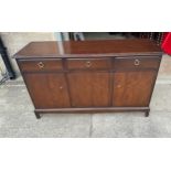 Stag three drawer three door sideboard measures approx 32 inches tall by 18 inches deep and 56