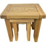Oak nest of 2 tables, largest measures approximately Height 20 inches, Width 19 inches, Depth 14.5