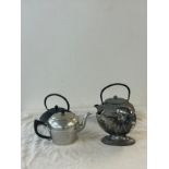 3 Metal teapots and a conical