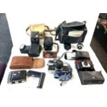 Selection of cameras and equipments includes Praktica mtl5b, Pentax etc all untested
