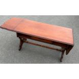 1 drawer drop leaf coffee table measures approximately 61 inches wide