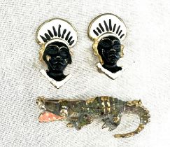 Pair of african clip on earrings and a crocodile brooch