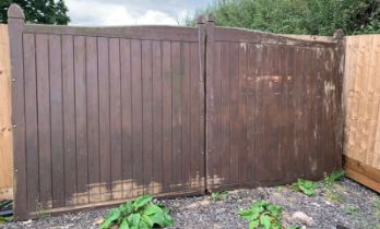 Two large outdoor wooden gates each gate measures approx 2 metres high by 2 metres wide