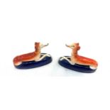 Pair of antique Staffordshire hand painted miniature dog figures measures approx 4.5 inches wide