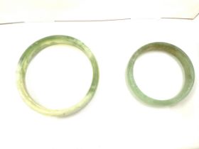 Two vintage jade bangles