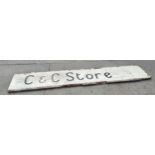 Vintage wooden shop sign ' C&C Store' measures approx 107 inches long by 19 inches tall