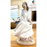 LLadro lady in a dress figure measures approx 10.5 inches tall