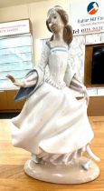 LLadro lady in a dress figure measures approx 10.5 inches tall