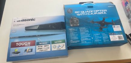 Brand new in box panasonic DVD player and a RC Quadcopter with camera, both untested