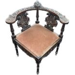 Antique carved corner chair, approximate measurements: Height 29 inches, Width 28 inches