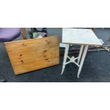 Two vintage tables one folding and the other a bobbin table largest measures 29 inches long and 22