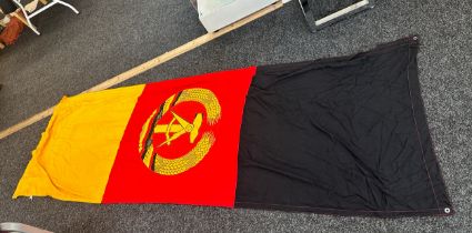 Vintage East Germany flag measures approx 109 inches long by 38 inches wide