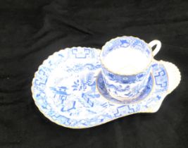 Royal Worcester oriental blue and white pattern cup and serving saucer, measures approx 8 inches