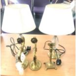 Selection of brass items to include a pair of lamps, pair of wall lights and a candle stick